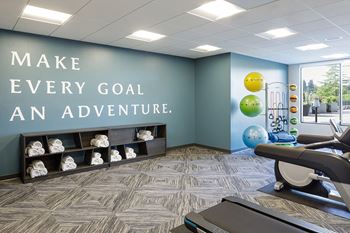 Fitness room with cardio and weight equipment